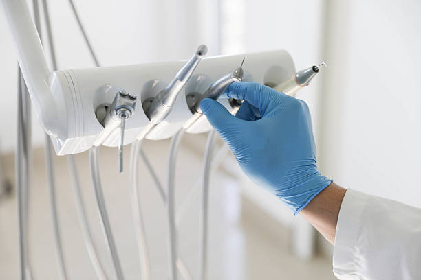 Professional Tooth Extraction technician working in Oakbrook Terrace, IL